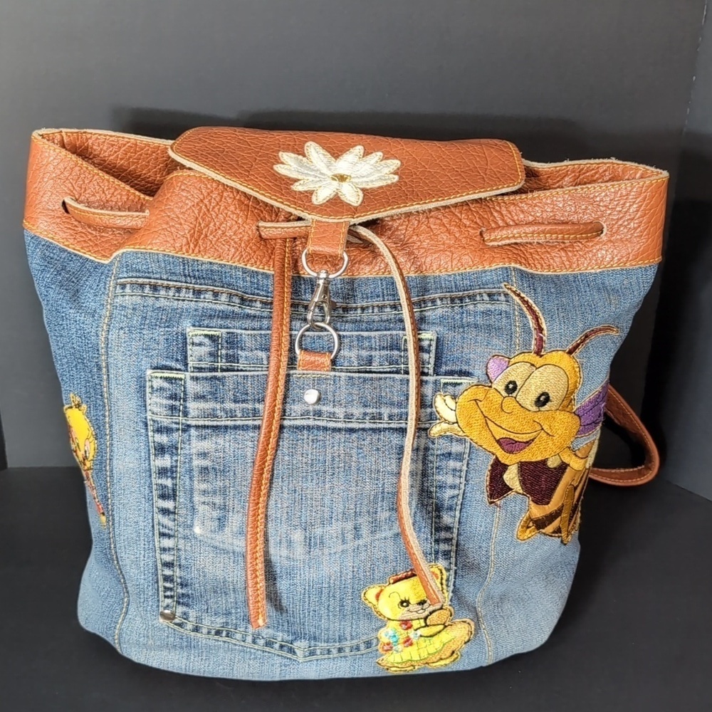 Vintage Jean/Faux Leather Medium Backpack with added Character Patches .